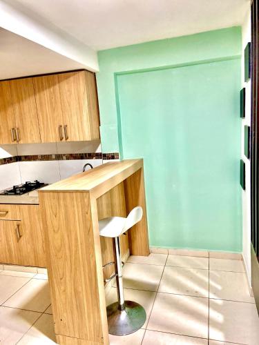 Una cocina o zona de cocina en Estancia casa gris primer piso privado Jm
