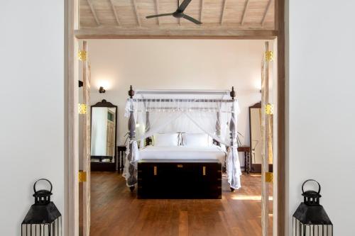 Postel nebo postele na pokoji v ubytování Haritha Villas & Spa