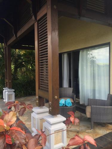 Ein Sitzbereich in der Unterkunft Villa Serenité