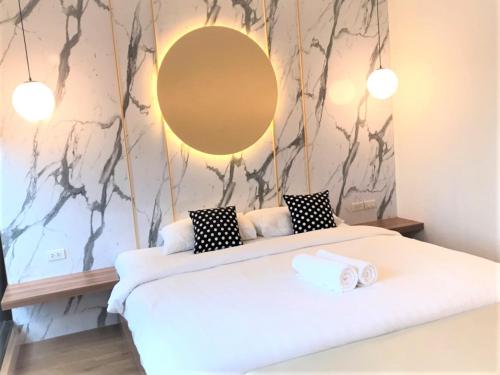Postel nebo postele na pokoji v ubytování La La Moon Krabi Poshtel'n' Pool