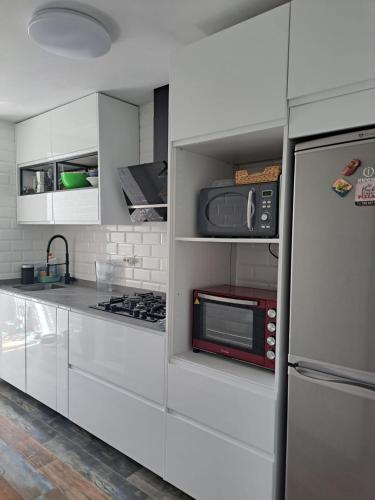 Apartamento con jardín y piscina Pet friendly