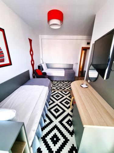 Postel nebo postele na pokoji v ubytování Motel Via Targu Mures