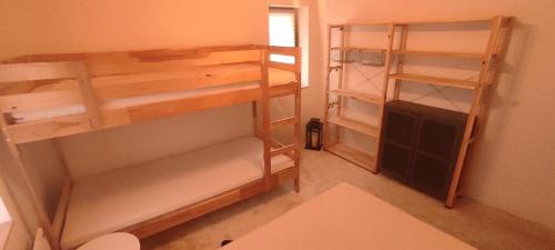 a room with two bunk beds in a room at Marina apartment in Stoykite