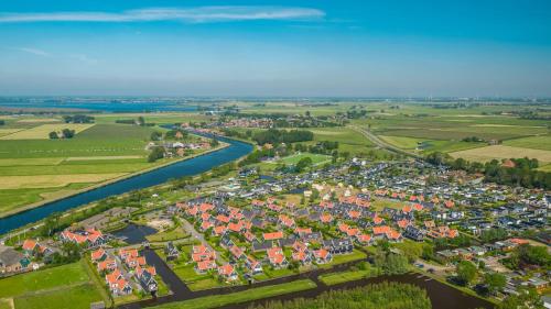 an aerial view of a city with a river at De Beemster | Holiday park near Amsterdam in De Rijp