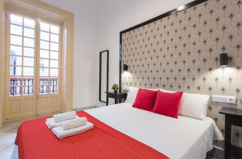 Postel nebo postele na pokoji v ubytování Palacete Centro Duque de Valais