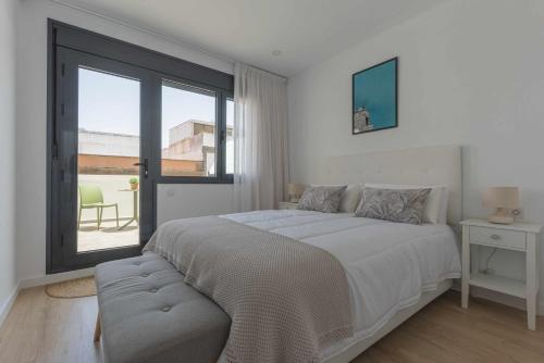 Postel nebo postele na pokoji v ubytování Los Adelantados El Patio Live Canarias