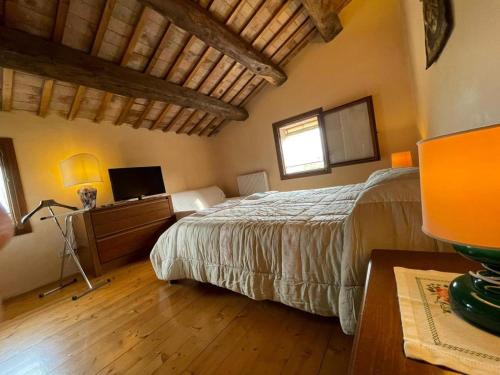 Posteľ alebo postele v izbe v ubytovaní La Casa di Laura