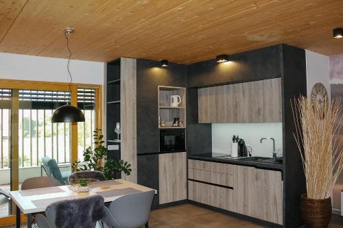 Η κουζίνα ή μικρή κουζίνα στο Residence Novak Bohinj