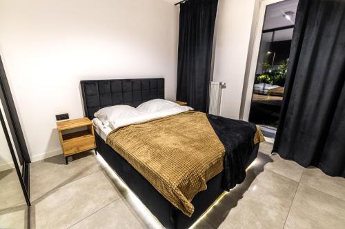 Кровать или кровати в номере Exclusive Place