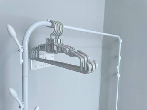 a shower with a chrome shower head in a bathroom at Jesselton Quay,2BR,4-5pax,Mountain view in Kota Kinabalu