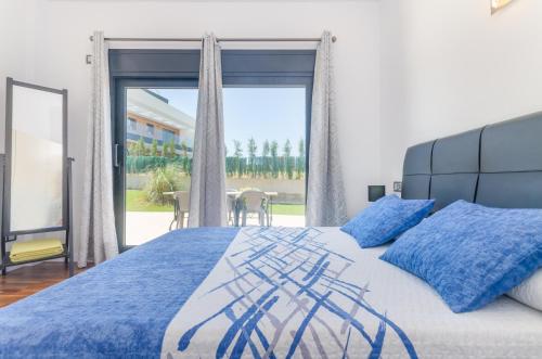 A bed or beds in a room at La Primera