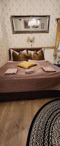 Postel nebo postele na pokoji v ubytování St. Terezie - Baroque Residence