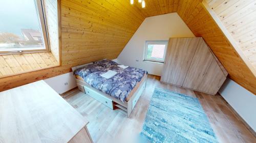 Postel nebo postele na pokoji v ubytování Apartmány U Mirase