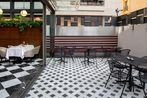 Un restaurante u otro lugar para comer en Wish More Hotel Şişli