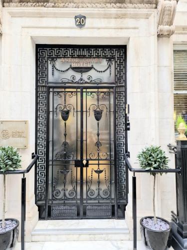 a black door on the side of a building at Astor Court Hotel in London
