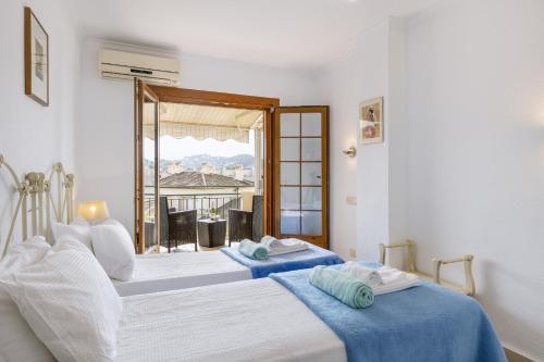 Postel nebo postele na pokoji v ubytování La Isla Penthouse