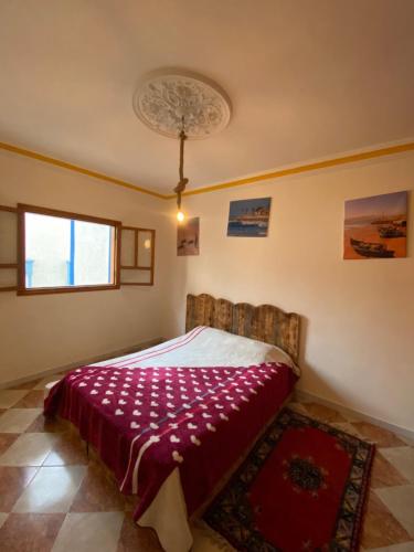 Кровать или кровати в номере Ayour Hostel Taghazout