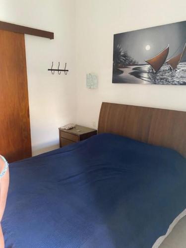 Tempat tidur dalam kamar di Apartamento Taiba Beach Resort