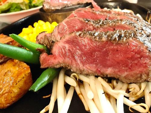 a plate of food with meat and pasta and vegetables at Kurume Hotel Esprit in Kurume