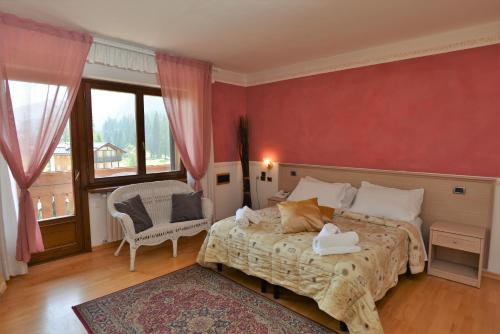 Postel nebo postele na pokoji v ubytování Hotel Marianna