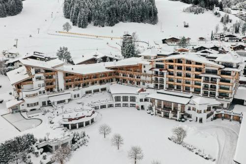 an aerial view of a hotel in the snow at Sporthotel Ellmau in Tirol in Ellmau
