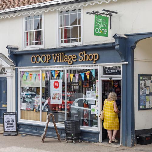 a woman standing in the doorway of a shop at Georgina in Lavenham