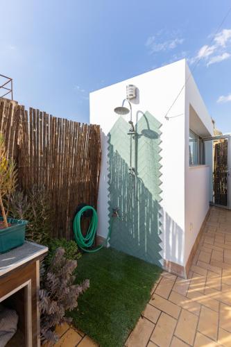 Tentudia Apartments with Private Roof-Top or Patio and FREE Underground Parking via Car Lift -Medium Size Car- By OCityzen