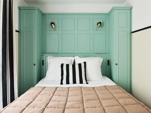 Postel nebo postele na pokoji v ubytování New Hotel Lafayette