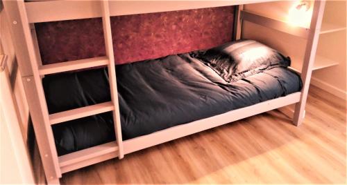 Ліжко або ліжка в номері Le Penty de Nalzu