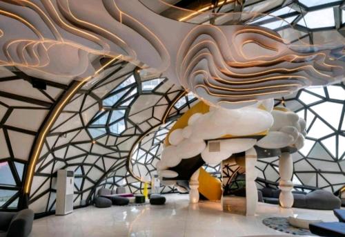 a sculpture of a cloud in a room with a ceiling at Arte Plus AMPANG by Zzzayn in Batu Empat