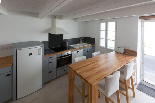 Kuchyňa alebo kuchynka v ubytovaní Les Maisons de l'Olivette
