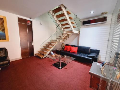 Zona de estar de Hotel Austral Suites By GHO Hoteles