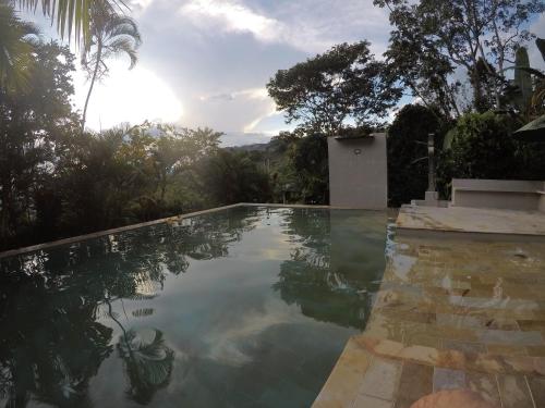 Gambar di galeri bagi Waterfall El Paraíso - Cabañas, jacuzzi, piscina y cascada en medio de la naturaleza di Nocaima