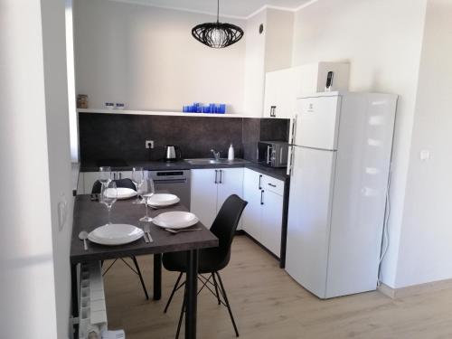 Dapur atau dapur kecil di Apartamenty 53