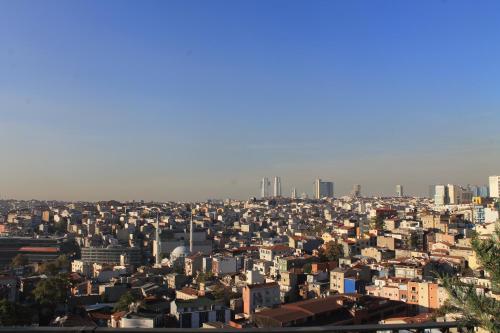 a view of a city with a lot of buildings at Garlon Residence in Istanbul