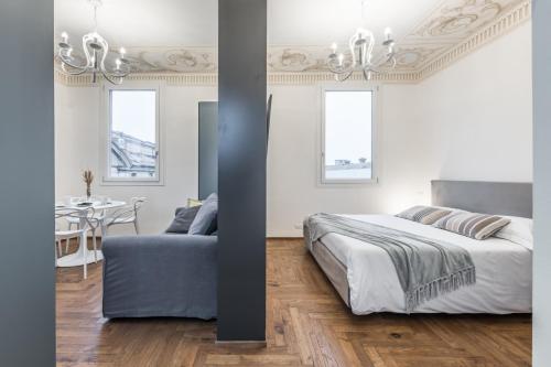 Tempat tidur dalam kamar di L'Altana di Emilia Suite