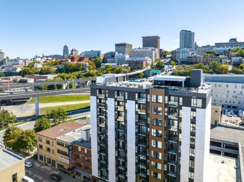 an aerial view of a city with buildings at Le Caïman in Quebec City
