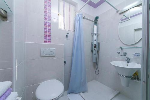 Kúpeľňa v ubytovaní Apartment Joni A2