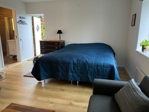 Postel nebo postele na pokoji v ubytování Jonstrupvejens Apartments Lejl B