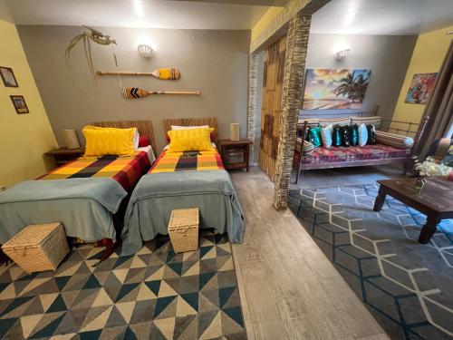 Ένα ή περισσότερα κρεβάτια σε δωμάτιο στο Villa Lulu Maison