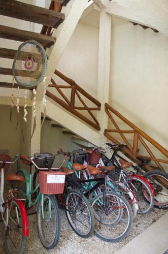 a group of bikes parked next to a wall at Aldea San Lam - Oasis Of Tulum in Tulum