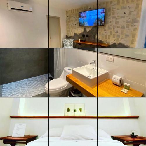 Cactus في بويرتو بكويريزو مورينو: حمام مع حوض ومرحاض ومرآة