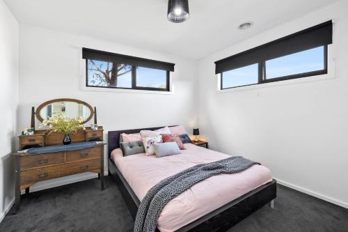 Postel nebo postele na pokoji v ubytování Muirfield Beach House 3a