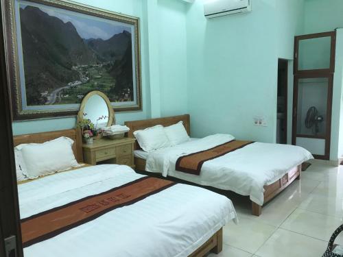 Ένα ή περισσότερα κρεβάτια σε δωμάτιο στο Thien An Guest House