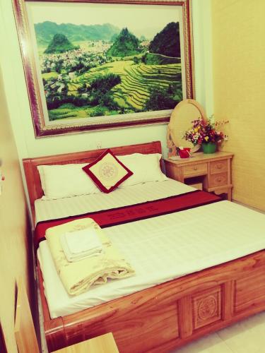 Ένα ή περισσότερα κρεβάτια σε δωμάτιο στο Thien An Guest House