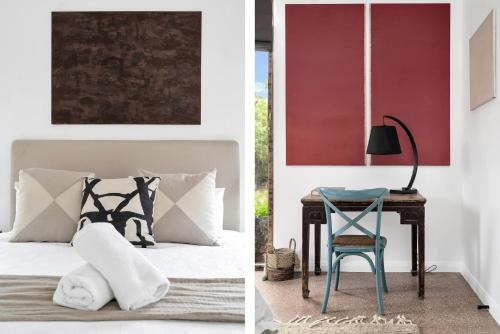 a bedroom with a bed and a table with a chair at Araluen House Werri Beach Gerringong in Gerringong