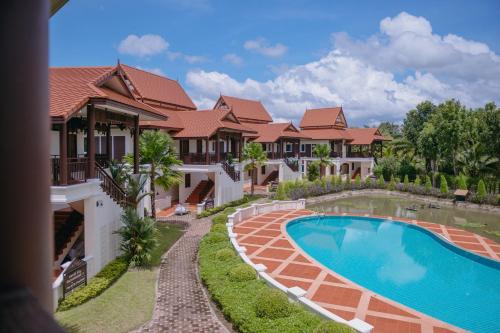 an aerial view of a villa with a swimming pool at Horizon Village & Resort SHA Plus in Doi Saket