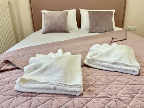 Posteľ alebo postele v izbe v ubytovaní Cute Nikis Apartment VIPGreece