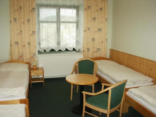 Postel nebo postele na pokoji v ubytování Penzion Velke Darko
