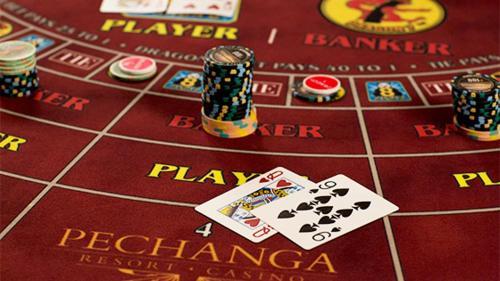 a game of poker with two cards and two playing chips at Wildflower Haven room in Hemet